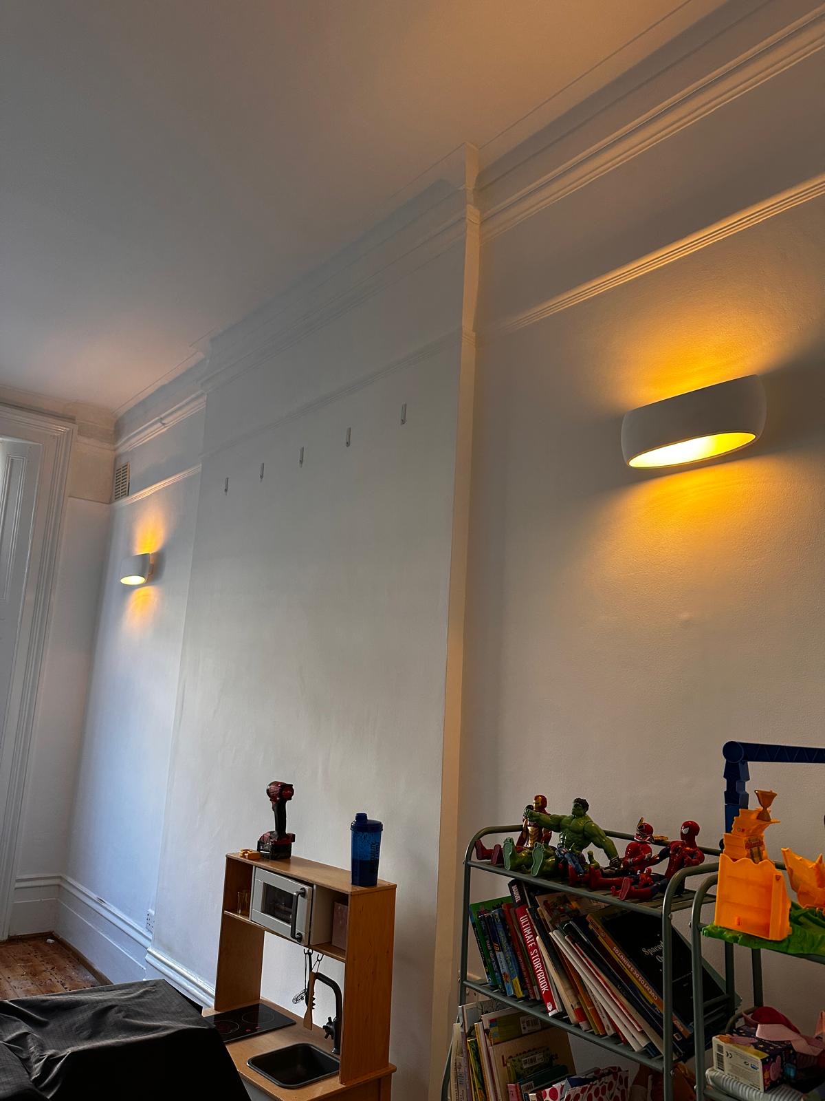 Kids room after: warm wall lights